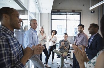 How Do Negative & Positive Attitudes Affect the Workplace?